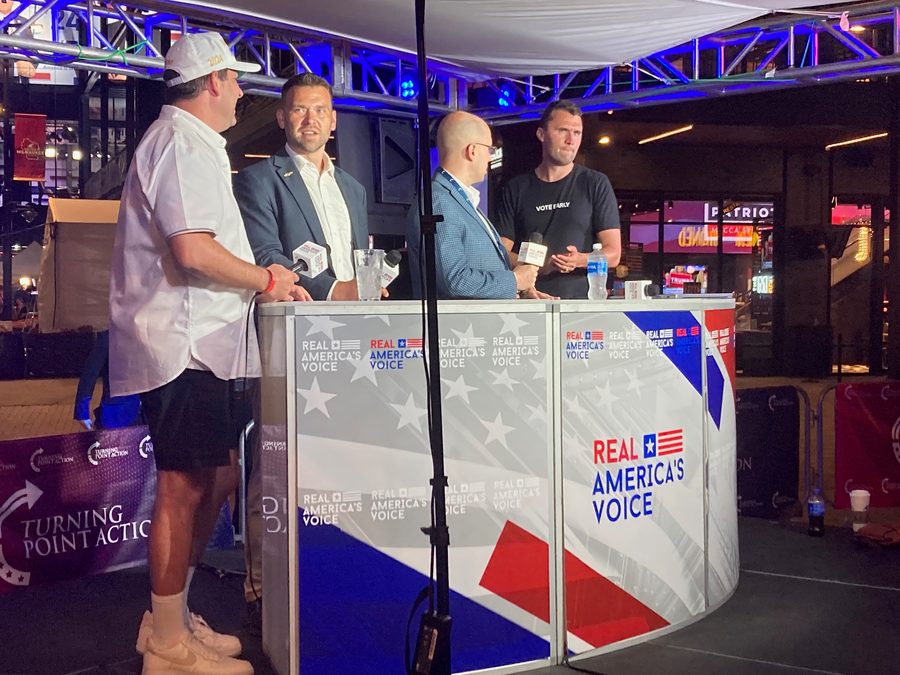 John Saletta with Charlie Kirk at the Turning Point Action set during RNC 2024
