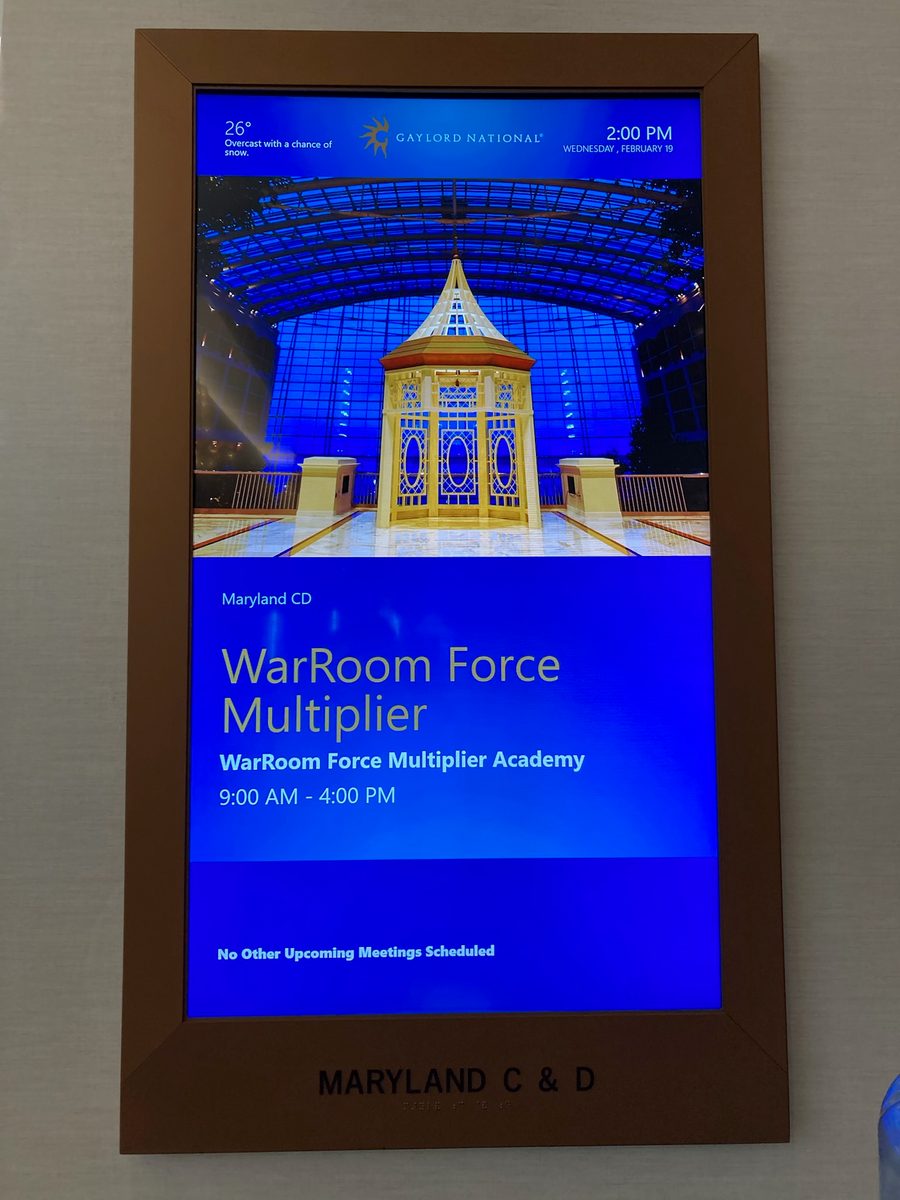 WarRoom Force Multiplier Academy sign at CPAC 2025